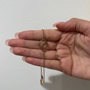 Rose gold adjustable bracelet.